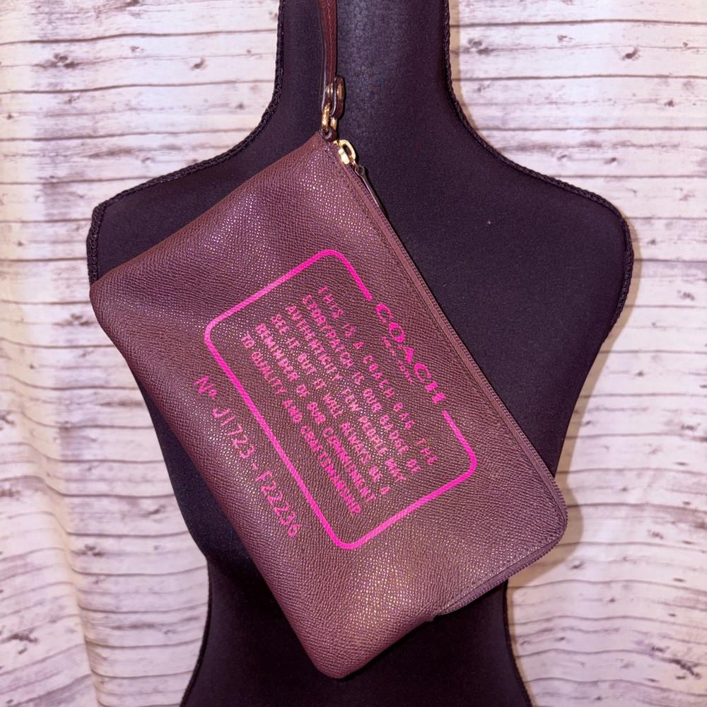 Coach Brown Wristlet with Pink Text